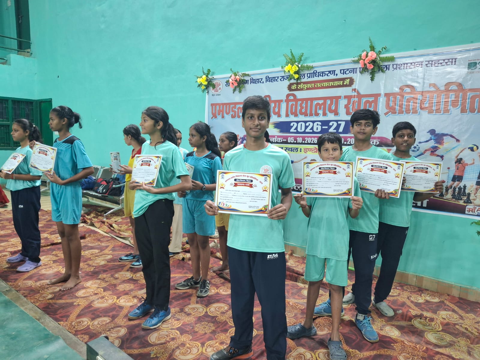 MVN table tennis players with their certificates at the Koshi Divisional Sports Meet